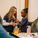 Girls across London are attempting to create the longest-ever friendship bracelet 