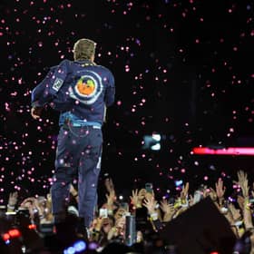 Coldplay have had to reschedule their final two Wembley Stadium shows due to Tube strikes.