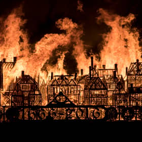 A 120-metre long wooden model of London's 17th-century skyline burns on the River Thames after it was set alight in a dramatic retelling of the story of the Great Fire of London on September 4, 2016 in London