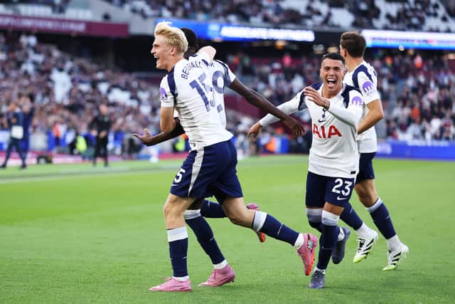 Pape Sarr of Tottenham Hotspur celebrates scoring his team's first goal with teammate Lucas Bergvall during the Premier League match between West Ham United and Tottenham Hotspur at London Stadium on September 13, 2025 in London, England.