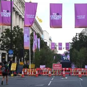 Pedestrians enjoy traffic-free shopping on Oxford Street