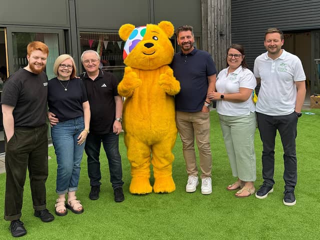 L-R: Joshua, Lynda, Dai Hill, Pudsey, Nick Knowles, Richard Driffield and Danielle Percival