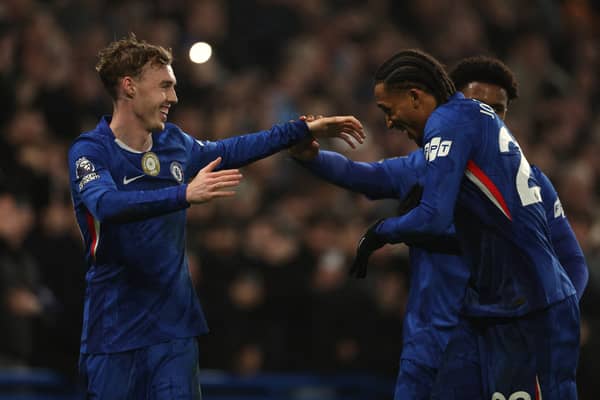 Chelsea's English midfielder #10 Cole Palmer (L) celebrates with Chelsea's Brazilian striker #20 Joao Pedro (R) after scoring their second goal from the penalty spot during the English Premier League football match between Chelsea and Leeds United at Stamford Bridge in London on February 10, 2026.