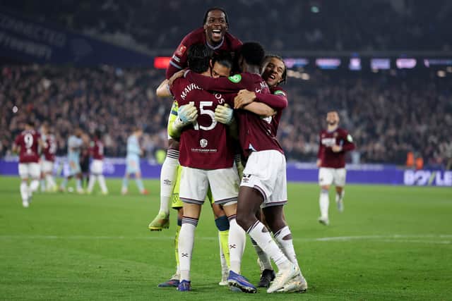 West Ham survive an FA Cup shootout.