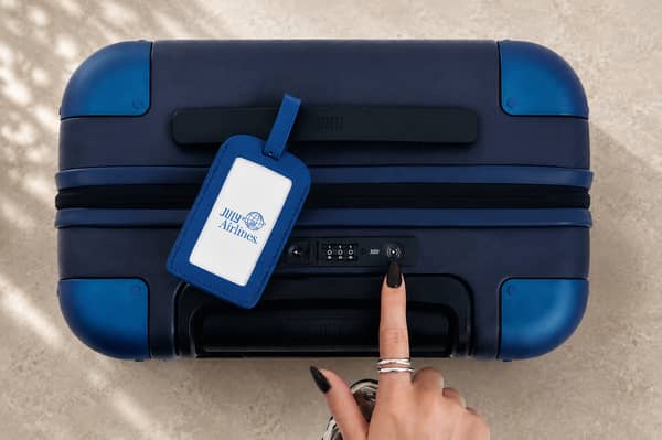 The integrated CaseSafe tracker is built directly into the TSA-approved lock, allowing the July suitcase to be located using Apple's Find My or Google's Find Hub networks without needing a separate tracking device.