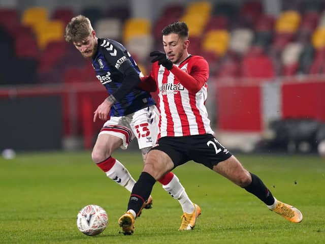 Brentford's Halil Dervisoglu (right).  