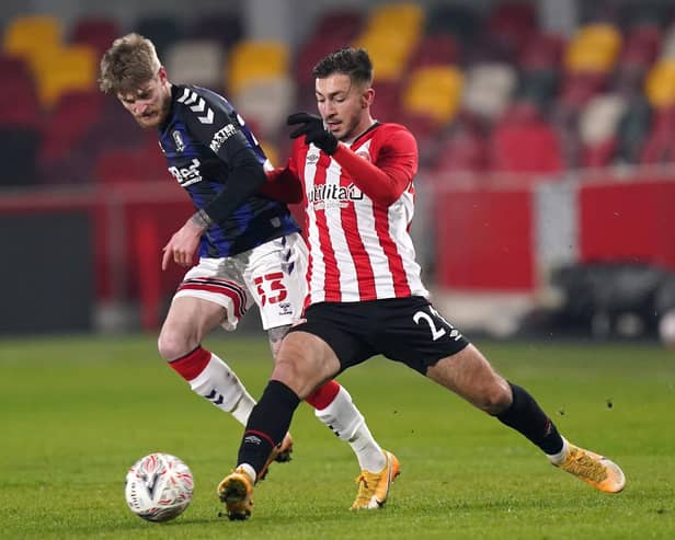 Brentford's Halil Dervisoglu (right).  