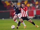 Brentford's Halil Dervisoglu (right).  