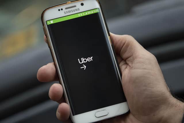 The Uber app.

Photo Illustration by Matthew Horwood/Getty Images