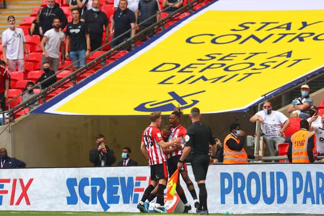 Ivan Toney (right) celebrates his goal for Brentford against Swansea in the Championship play-off final at Wembley. Photo: Catherine Ivill Getty Images.