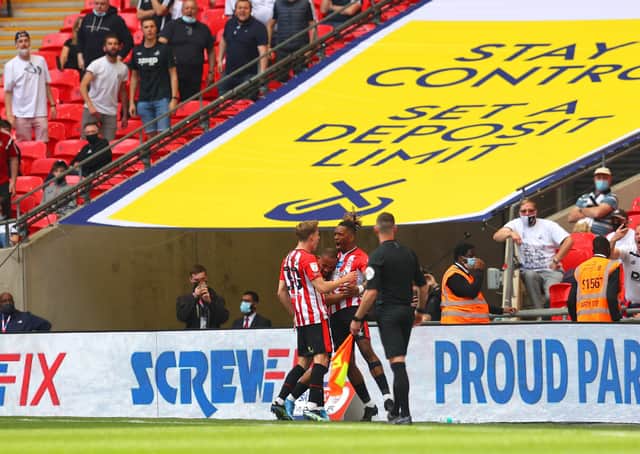 Ivan Toney (right) celebrates his goal for Brentford against Swansea in the Championship play-off final at Wembley. Photo: Catherine Ivill Getty Images.