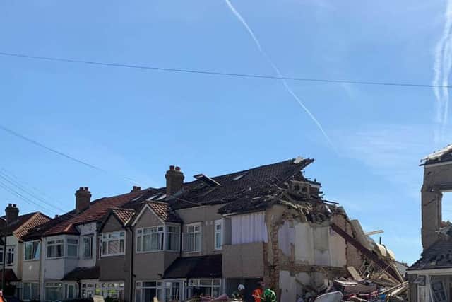 Handout photo issued by the London Fire Brigade of the scene in Galpin's Road in Thornton Heath, south London, where three people were rescued after a house collapsed amid a fire and explosion. Picture date: Monday August 8, 2022.