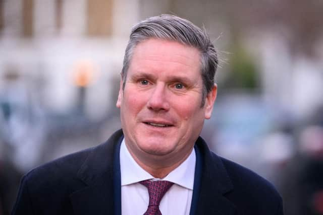 LONDON, ENGLAND - JANUARY 12: Labour Party leader Keir Starmer leaves his home ahead of the weekly PMQ session in the House of Commons, on January 12, 2022 in London, England. Prime Minister Boris Johnson is continuing to face pressure to answer questions regarding an alleged party held in number 10, Downing Street during the strictest period of Covid-19 isolation rules. (Photo by Leon Neal/Getty Images)