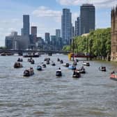 Fund Britain's Waterways campaigners cruise past the Houses of Parliament to deliver a message to MPs.