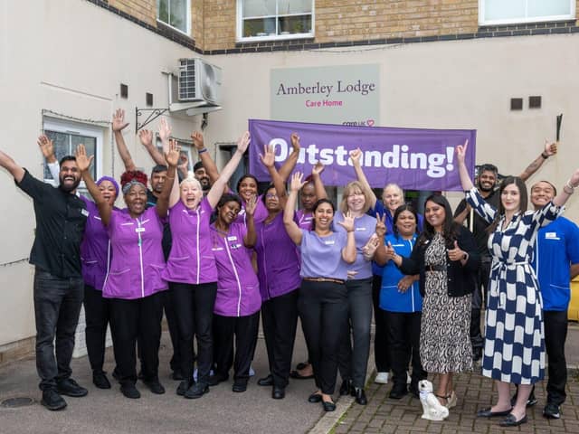 The team celebrate their success.
