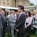 Louis Liu with HRH The Duke of Edinburgh and Ruth Marvel.