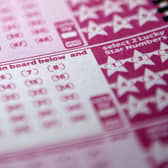 National Lottery are on the hunt for an unclaimed millionaire 