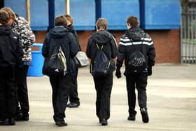 Pupils at Heath Park Business and Enterprise College, Wolverhampton, which has been named England's most improved school, according to league tables.