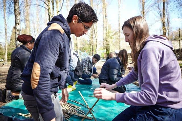 Explorer Scouts learning skills in the forest