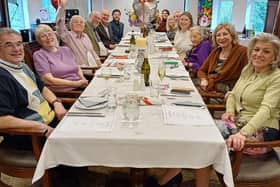 Audrey and Roger (both in middle) celebrating their 70th wedding anniversary with their family