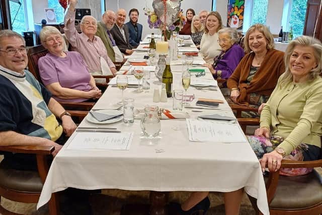 Audrey and Roger (both in middle) celebrating their 70th wedding anniversary with their family
