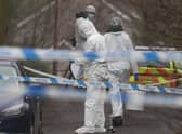 Forensic officers from Police Service of Northern Ireland (PSNI) at the sports complex in the Killyclogher Road area of Omagh