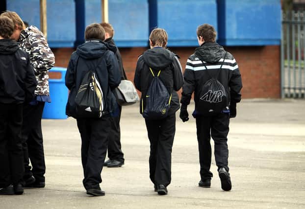 Pupils at Heath Park Business and Enterprise College, Wolverhampton, which has been named England's most improved school, according to league tables.