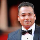 Krishnan Guru-Murthy has apologised “unreservedly” to Northern Ireland minister Steve Baker after swearing at him in an “unguarded moment”.