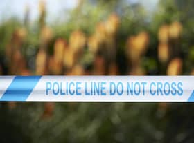 A cordon of police tape     (Photo credit should read NIKLAS HALLE'N/AFP via Getty Images)