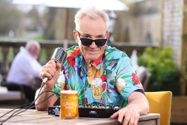 Larry Lamb basking in the sun, delivering The Sipping Forecast to help the country navigate unpredictable pub-garden weather this spring.
