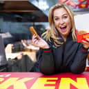 Josie Gibson behind the counter at the Iceland Chicken Shop in Fulham.