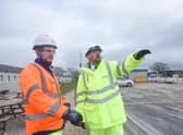 Transport minister Richard Holden (right) with contractor representative Luke Presho at the A585 Windy Harbour to Skippool site