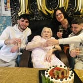 Denise with her daughter and two grandsons at Buchanan Court.