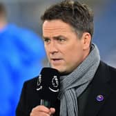 Former Liverpool and England player Michael Owen, working for Amazon Prime TV, works on the pitch ahead of the English Premier League football match between Crystal Palace and Bournemouth at Selhurst Park in south London on December 3, 2019.