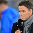 Former Liverpool and England player Michael Owen, working for Amazon Prime TV, works on the pitch ahead of the English Premier League football match between Crystal Palace and Bournemouth at Selhurst Park in south London on December 3, 2019.