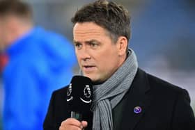 Former Liverpool and England player Michael Owen, working for Amazon Prime TV, works on the pitch ahead of the English Premier League football match between Crystal Palace and Bournemouth at Selhurst Park in south London on December 3, 2019.