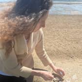 Collecting sea shells.