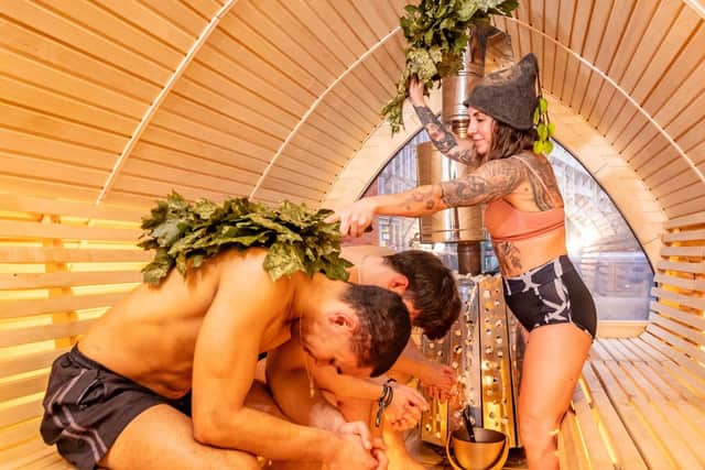 Leaf whisking as part of the King's Cross Mind Your Brain wellness campaign at Slomo Wellbeing saunas