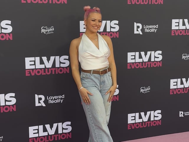 Molly swaps the ice for a pink carpet as she arrives all smiles.