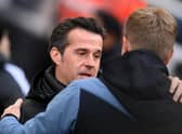NEWCASTLE UPON TYNE, ENGLAND - JANUARY 15: Marco Silva, Manager of Fulham, embraces Eddie Howe, Manager of Newcastle United, prior to the Premier League match between Newcastle United and Fulham FC at St. James Park on January 15, 2023 in Newcastle upon Tyne, England. (Photo by Stu Forster/Getty Images)