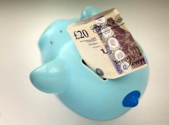 File photo dated 06/01/15 of money in a piggy bank. Boris Johnson is "abandoning millions" to hardship by pushing ahead with the fiercely opposed cut to Universal Credit (UC), a charity has warned. In 35 parts of Britain, at least half of working-age families with children will be hit by the removal of the £20-a-week uplift, the Joseph Rowntree Foundation (JRF) has said.