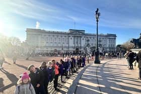 Pupils outside Buckingham Palace