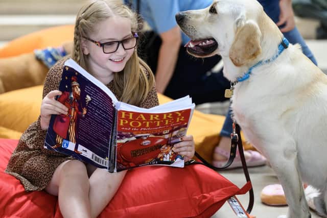 Anya aged 8 with guide dog Moxy.