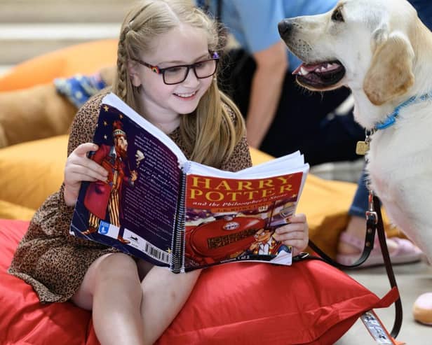 Anya aged 8 with guide dog Moxy.
