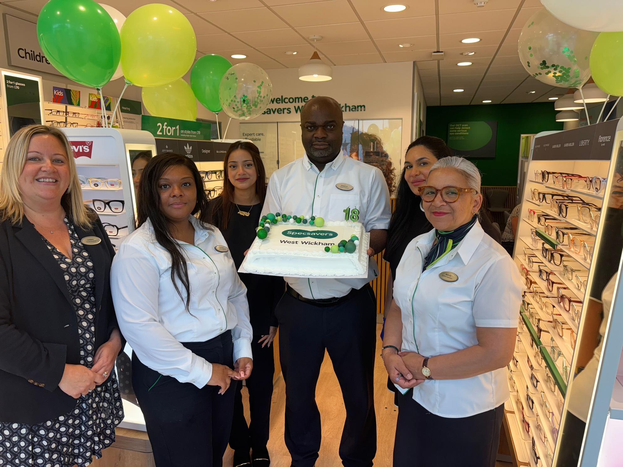 Opticians marks 18 years with store relaunch and visit from deputy mayor