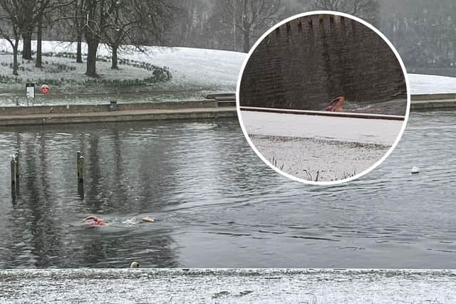 A man was caught on video swimming in Roundhay Park's Waterloo Lake in Leeds during freezing temperatures and warnings in place for snow.