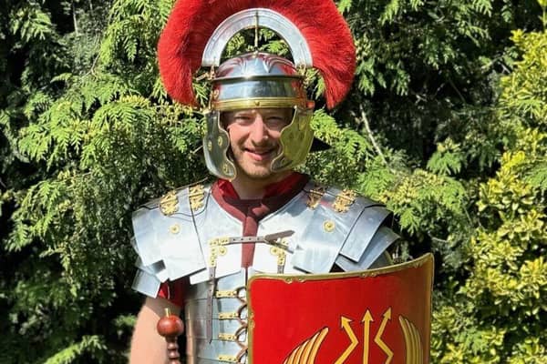 Chris Castle dressed in 35 kg of armour.
