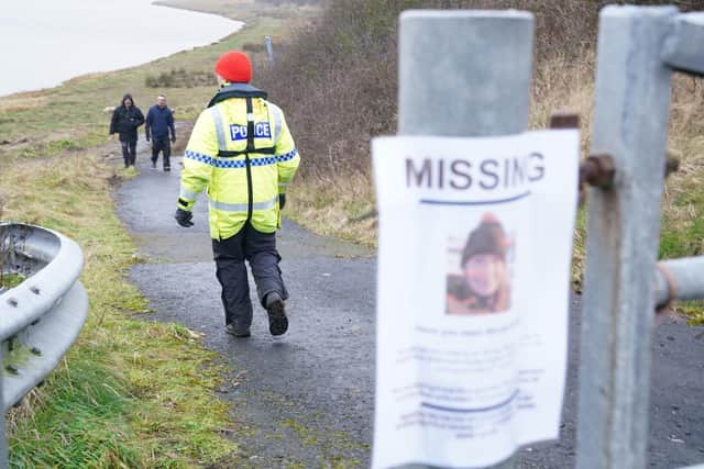 RETANSMITTING AMENDING LOCATION A member of the police Search and Rescue team waits at Shard Bridge for a boat to come down the River Wyre in Lancashire, as police continue their search for missing woman Nicola Bulley, 45, who was last seen two weeks ago on the morning of Friday January 27, when she was spotted walking her dog on a footpath by the nearby River Wyre. Picture date: Friday February 10, 2023.