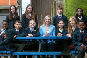 Headteacher Fiona McCloskey with pupils at Douay Martyrs Catholic Secondary School.