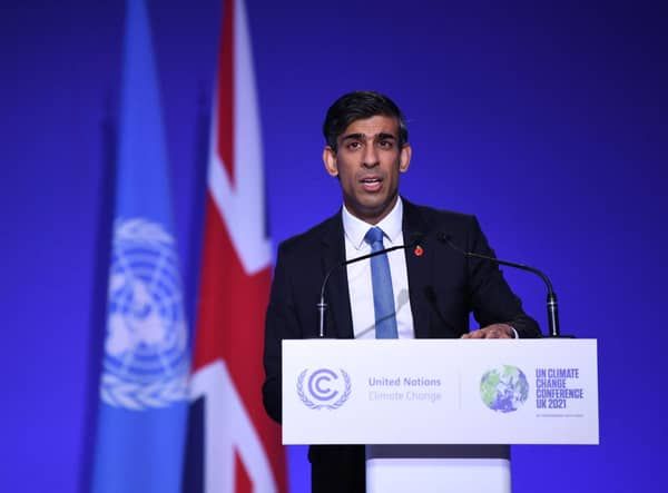 Rishi Sunak pictured delivering a speech at the COP26 UN Climate Summit in Glasgow last year. PIC: DANIEL LEAL/AFP via Getty Images